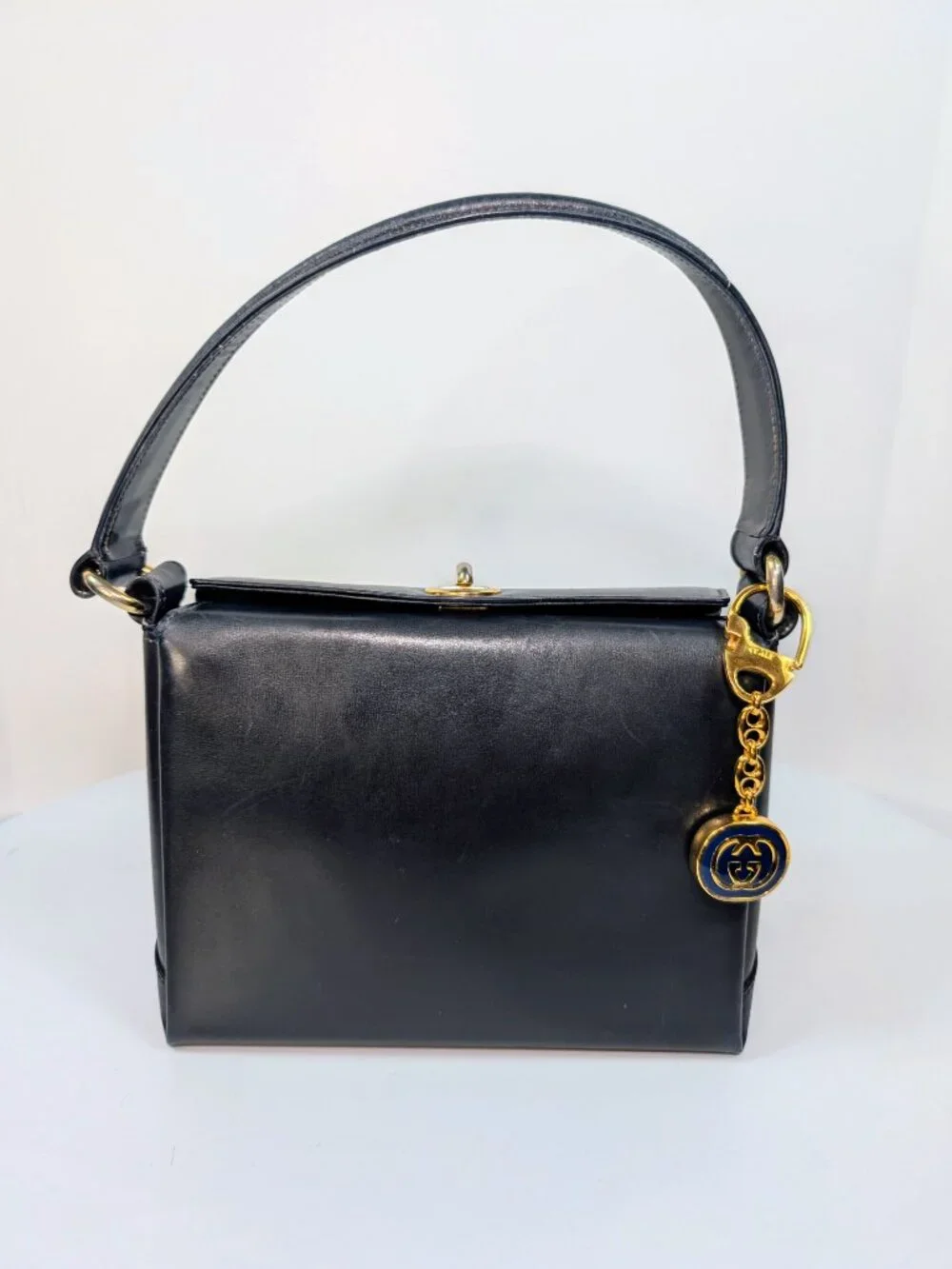 Gucci Vintage Gold Tone GG Logo Embossed Circle Bag Charm